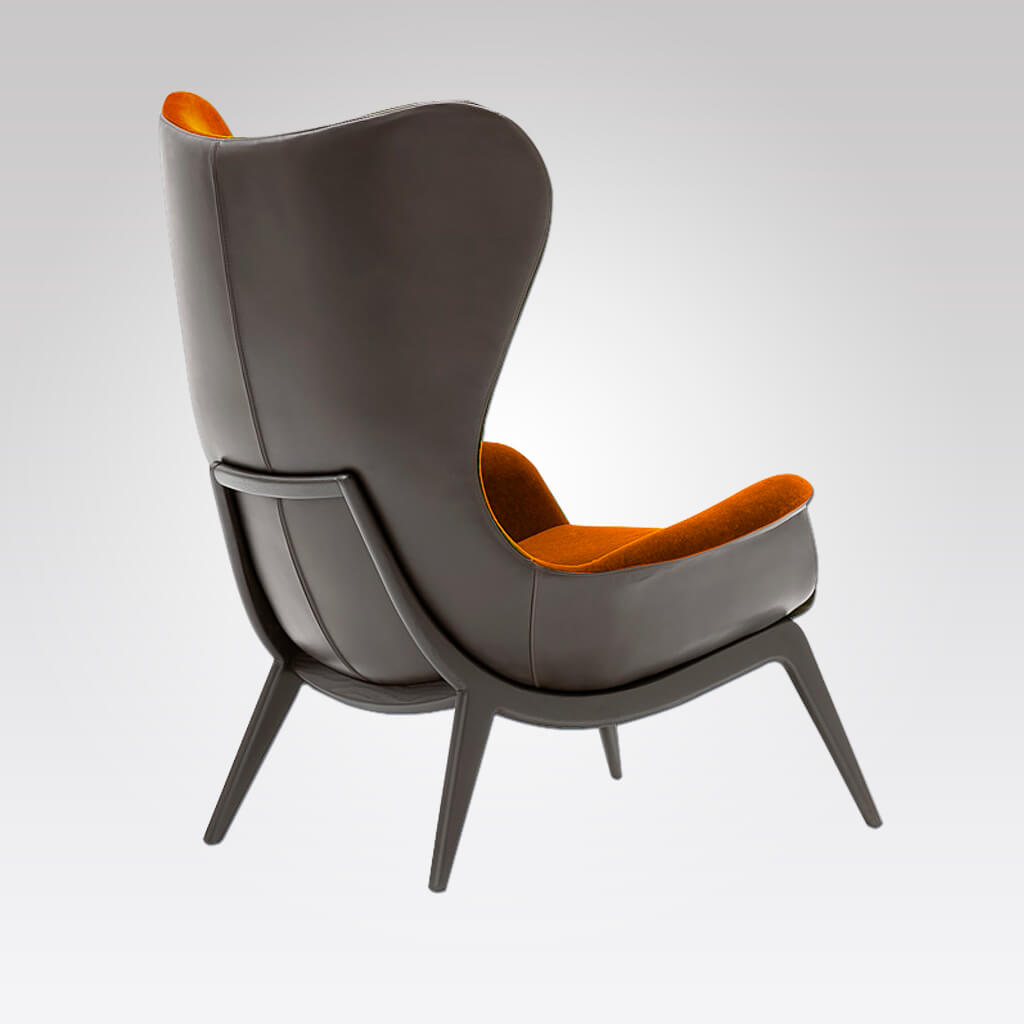 Nirvana Burnt orange lounge chair with shell back in faux leather