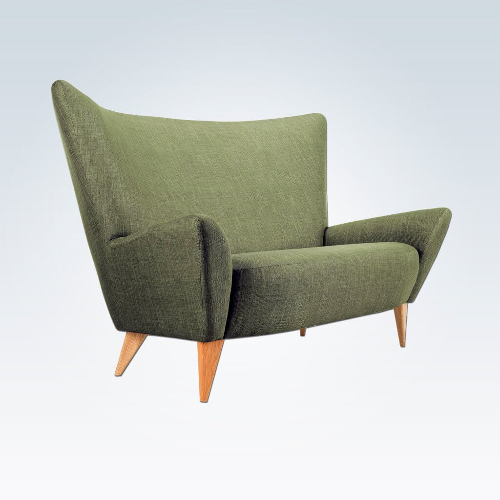 Arina green accent chair with winged back and tapered wooden legs