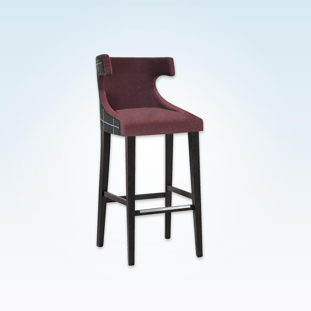 Capture plum bar stool with high hammerhead backrest and sturdy timber legs with metal reinforced kick plate 