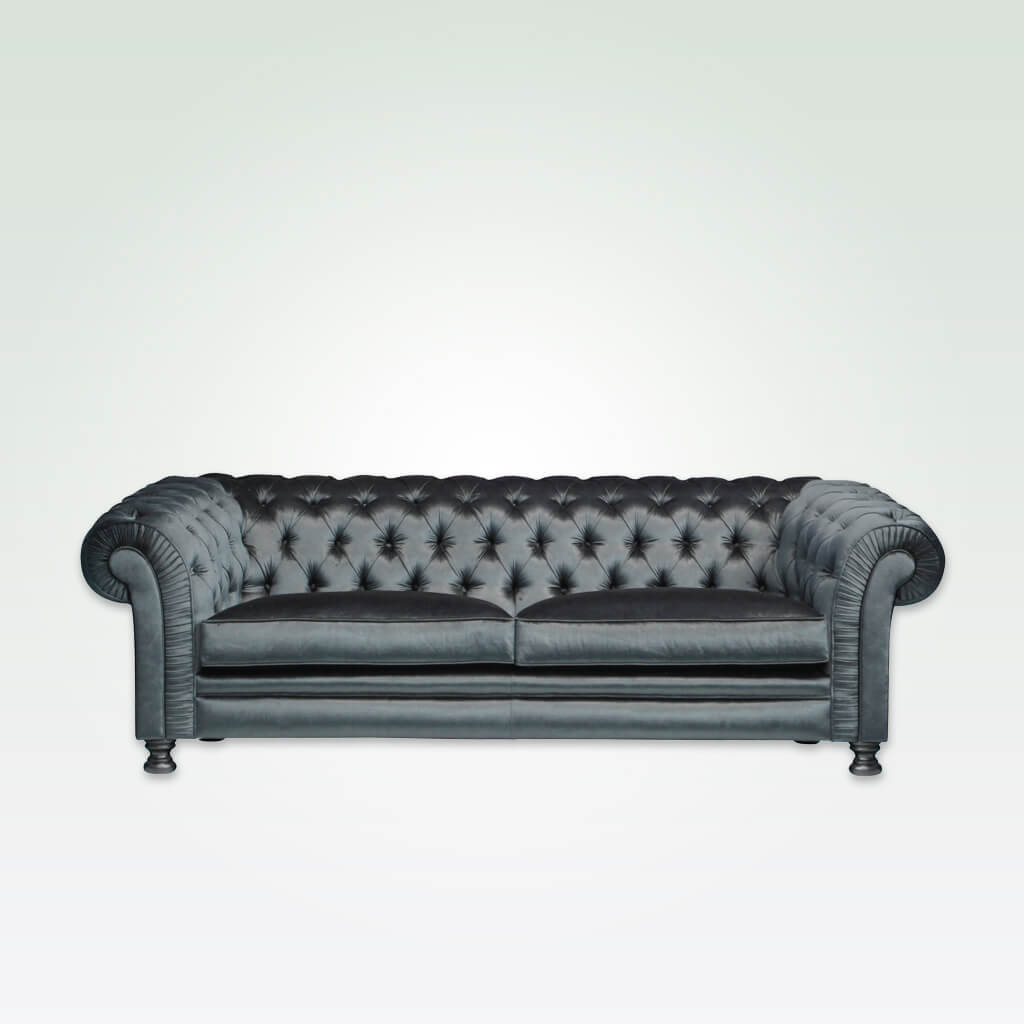 Chester grey velvet sofa with scroll arms and back featuring deep buttoning and bun feet 