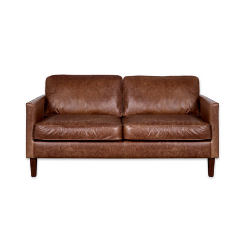 Dahl light brown leather sofa with deep back and seat cushions and tapered wooden