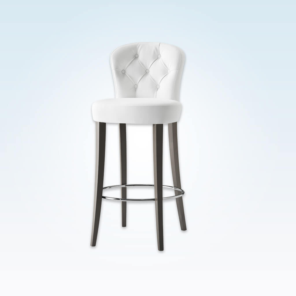 Euforia curved white bar chair with buttoning detail round seat and tapered timber legs with a round metal kick plate