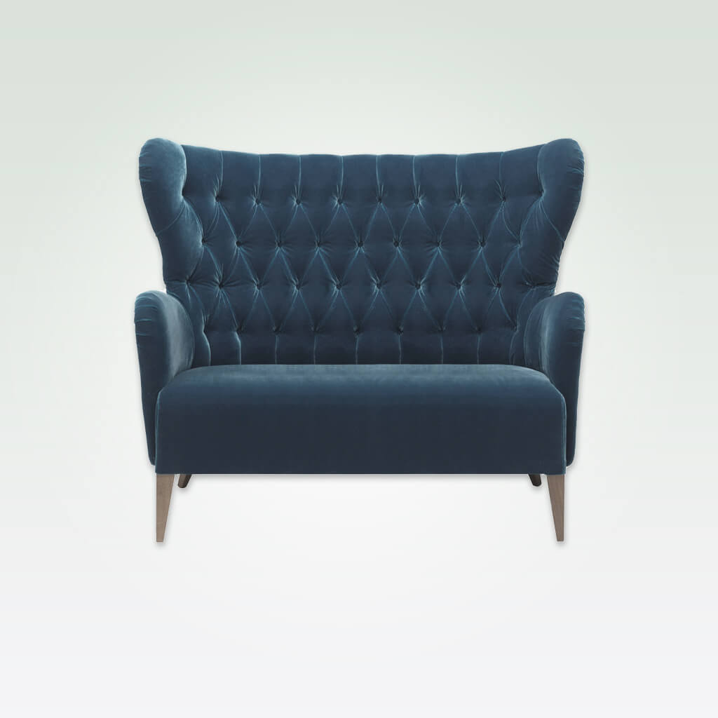 Heather winged high back velvet sofa in blue with decorative buttoning and tapered legs 