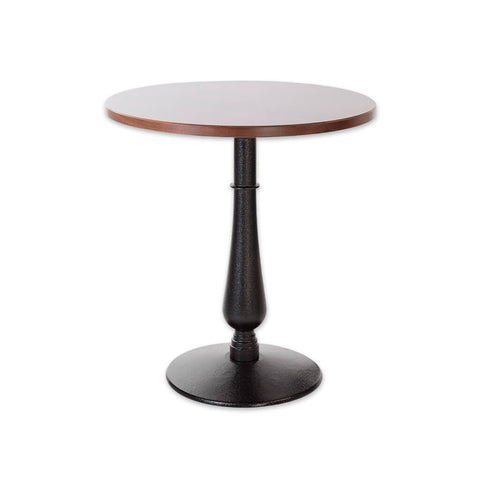 Masa detailed single pedestal black and brown dining table with round base and round wooden top