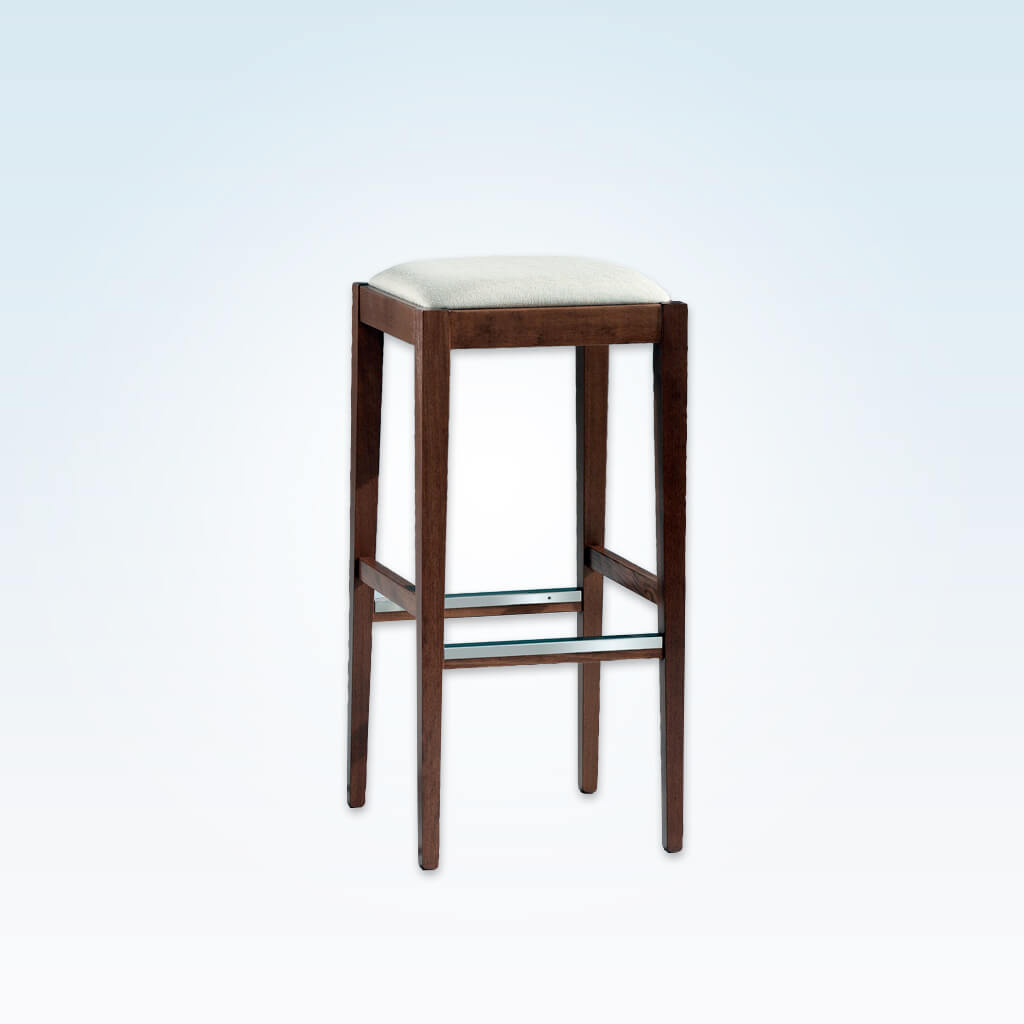 Mirna brown backless bar stools with cushioned seat and metal trim to the kick plate