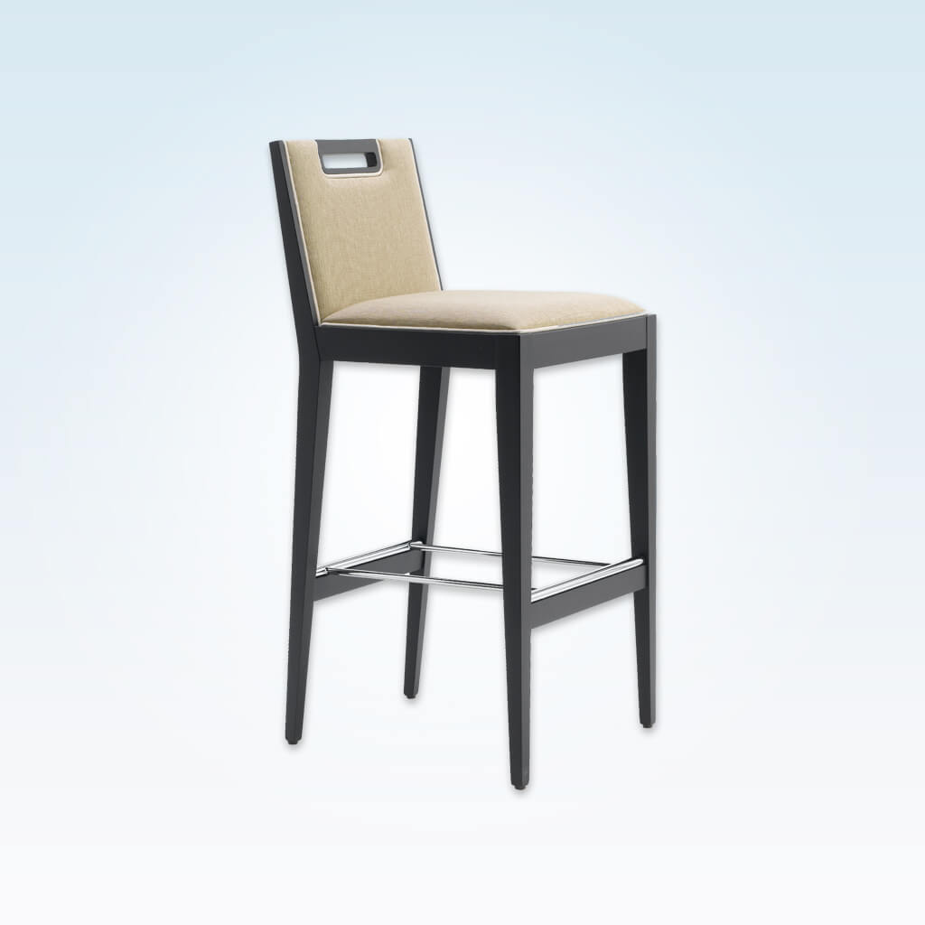 Roka cream fabric bar stool with back detail, show wood trim and wooden legs with a metal kick plate