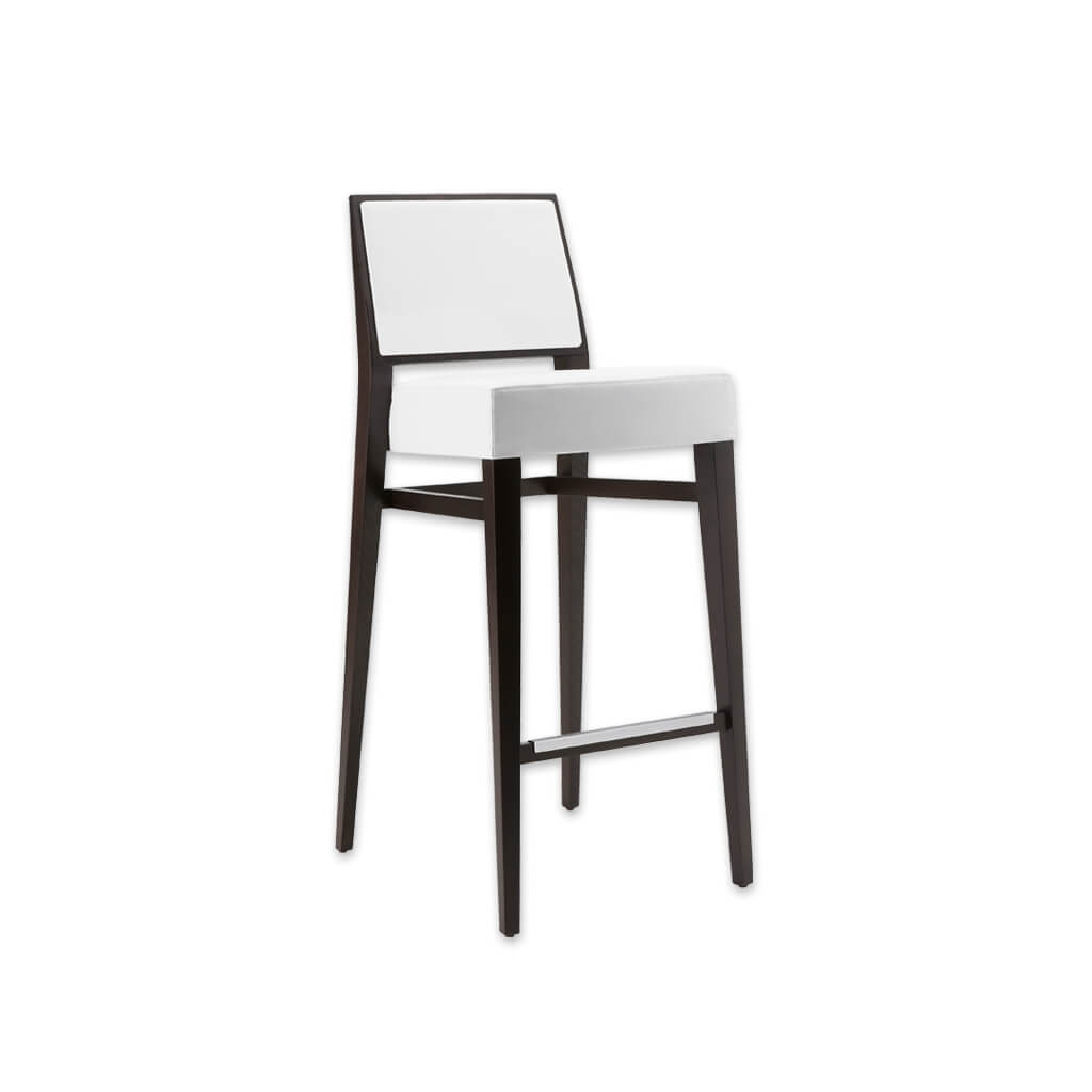 Timberly white and black bar stool with deep padded cushion and square backrest. Tapered wooden legs and a metal trimmed kick plate - Designers Image