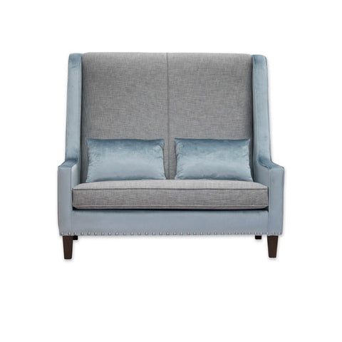 Tono grey and blue studded sofa with contrast upholstery, high back and loose cushions 