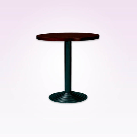 Velino circular dark wood dining table with ridge detail metal base plate and pedestal