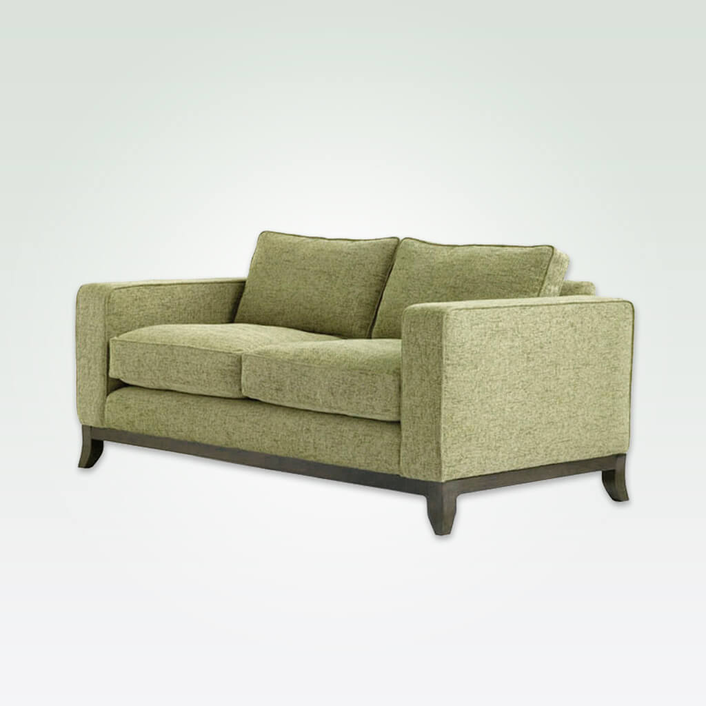 Winchester lime green fabric sofa with deep padded cushions and splayed wooden feet