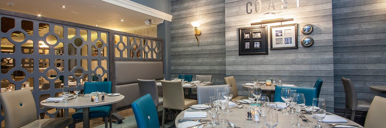 Restaurant seating and tables in blue and greys