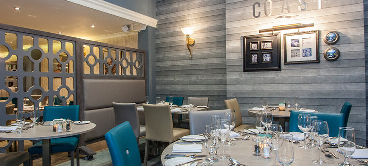 Restaurant seating and tables in blue and greys