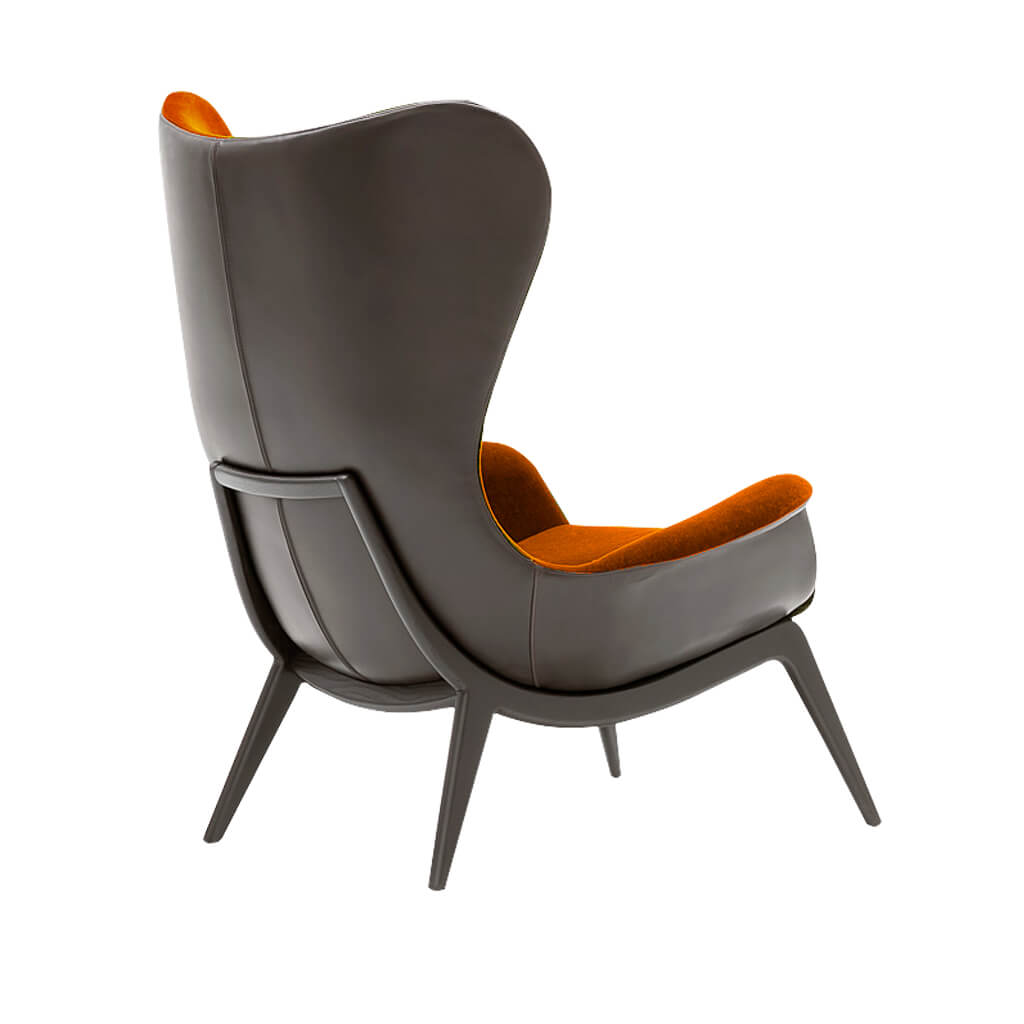 Nirvana Burnt orange lounge chair with shell back in faux leather - Designers Image