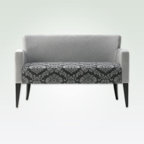 Bitonti grey floral sofa upholstered with contrast arms and tapered wooden legs
