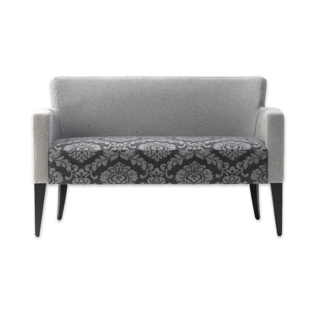 Bitonti grey floral sofa upholstered with contrast arms and tapered wooden legs - Designers Image