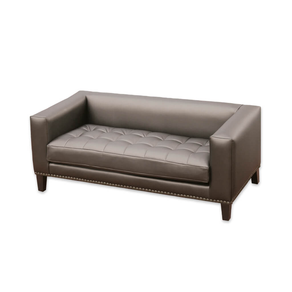 Blog brown studded sofa with square arms and back, decorative buttoning to the seat cushion - Designers Image