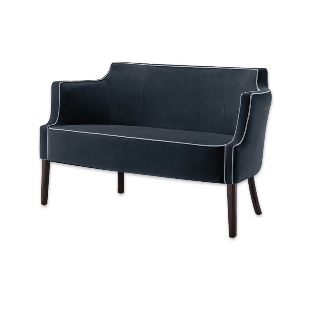 Brizio dark blue fabric sofa with contrast piping and exaggerated curved back and arms sitting proud on slim wooden legs  - Designers Image