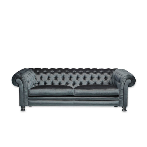 Chester grey velvet sofa with scroll arms and back featuring deep buttoning and bun feet 