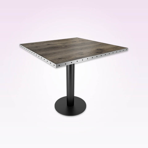 Copito grey bar table with metal trim top and black pedestal base