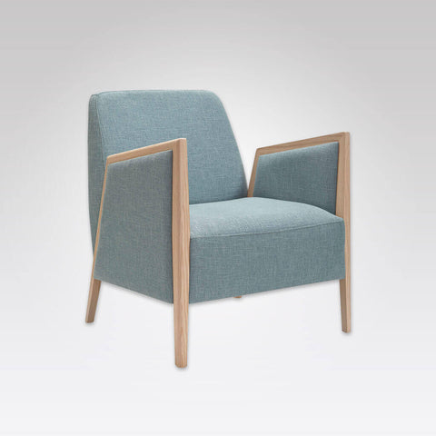 Fully upholstered powder blue Edwin lounge chair with exposed wood arms