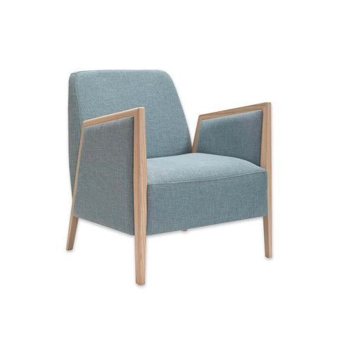 Fully upholstered powder blue Edwin lounge chair with exposed wood arms