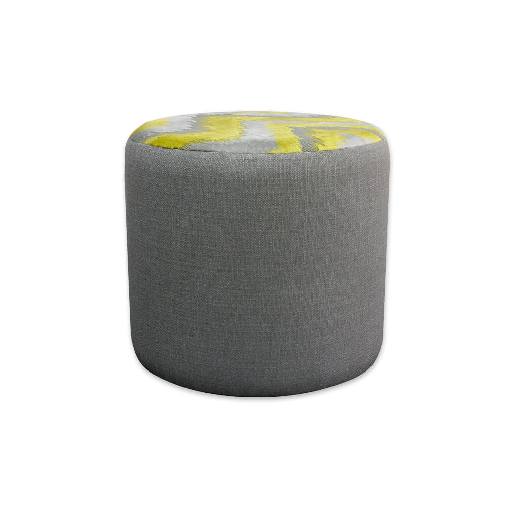 Enya upholstered grey circle ottoman with contrast fabric to the top - Designers Image