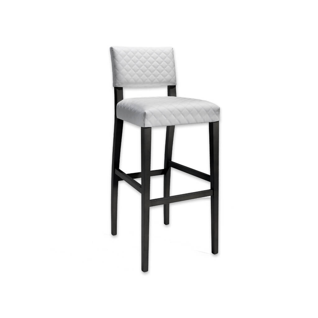 Keela white and black bar stool with textured upholstery and black wooden legs - Designers Image