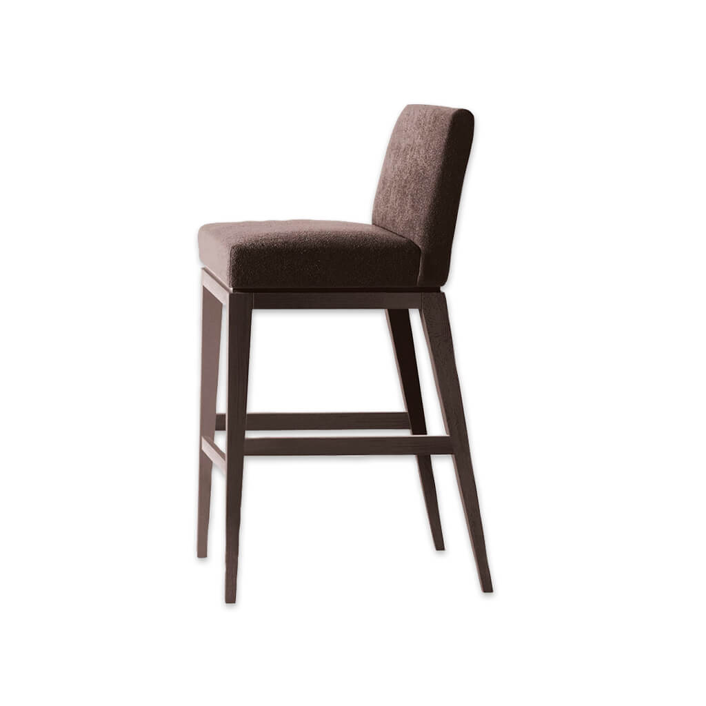 Libera brown bar stool with deep padded seat and timber frame with splayed legs to the rear - Designers Image