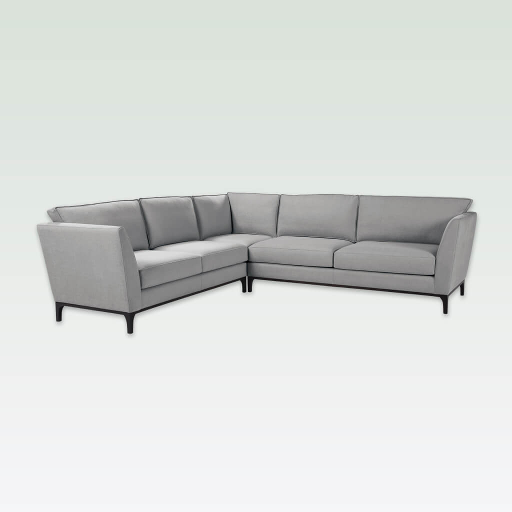 Grimaud grey material corner sofa with deep padded cushions and tapered legs