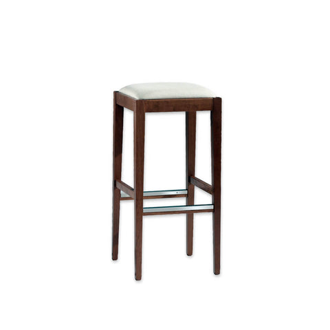 Mirna brown backless bar stools with cushioned seat and metal trim to the kick plate