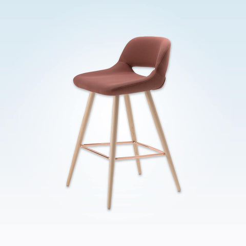 Ola pink bar stool with oversized seat, curved back and wide tapered conical legs with copper kick plate