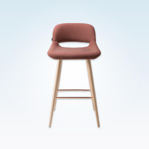 Ola pink bar stool with oversized seat, curved back and wide tapered conical legs with copper kick plate