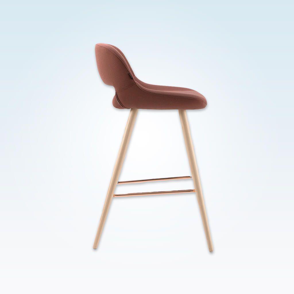 Ola pink bar stool with oversized seat, curved back and wide tapered conical legs with copper kick plate - Side View