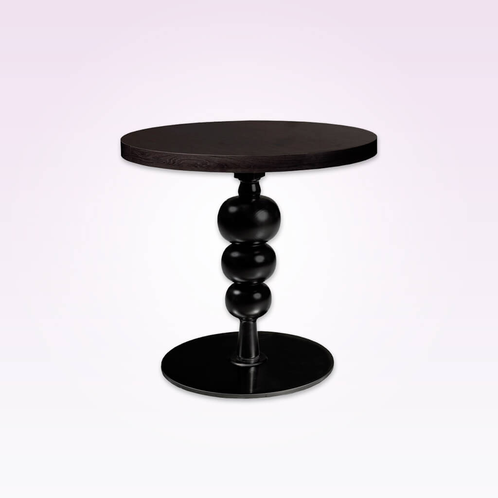 Soli black contemporary dining table with oversized pedestal and round top