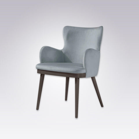 Stella Fully Upholstered Light Blue Wing Chair with Show Wood Plinth and Conical Legs