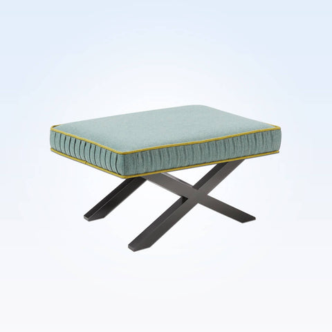 Tijera small green ottoman with contrast piping and cross leg wooden base 