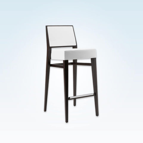 Timberly white and black bar stool with deep padded cushion and square backrest. Tapered wooden legs and a metal trimmed kick plate