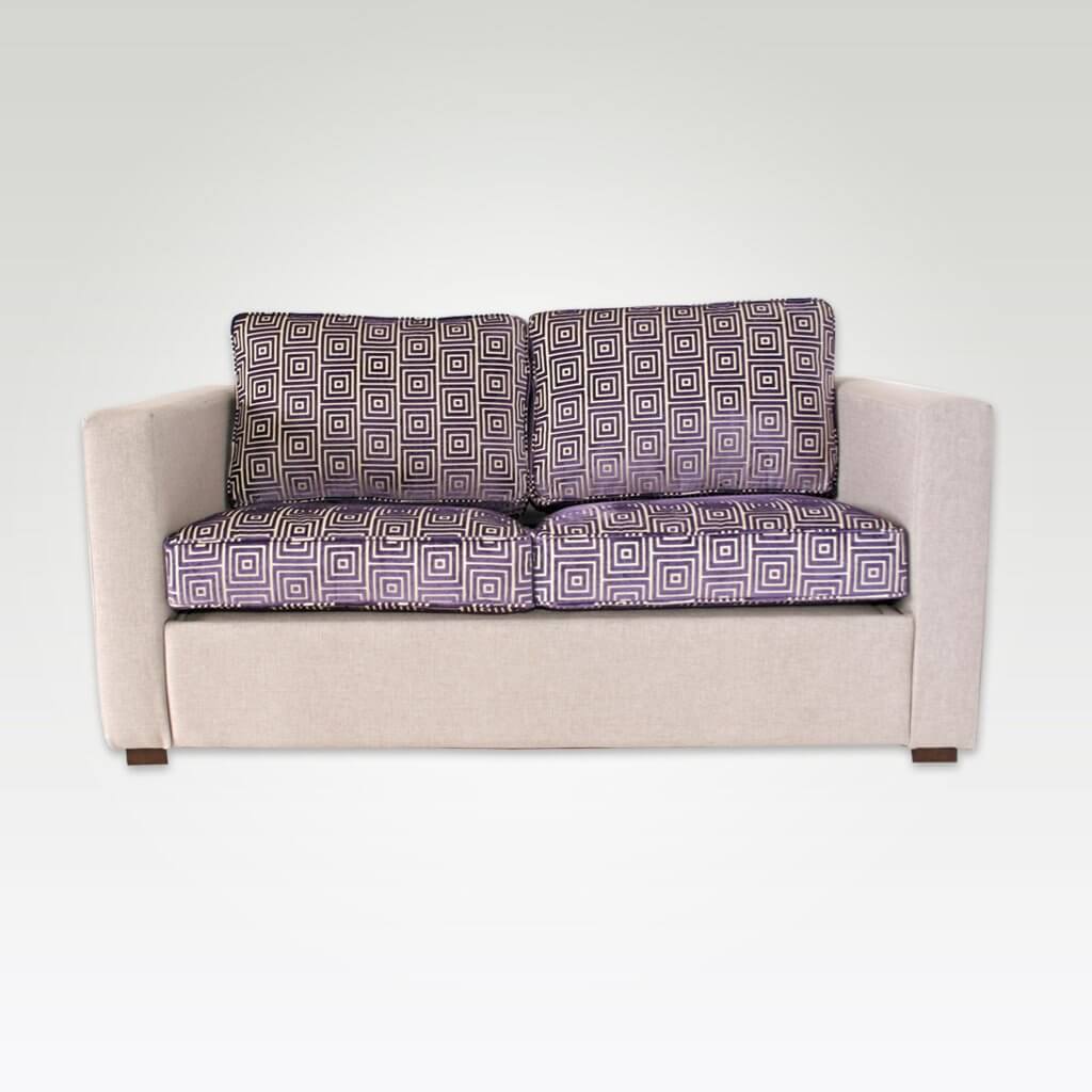 Trinity purple fabric hotel sofa bed with contrasting cushions and upholstered frame 