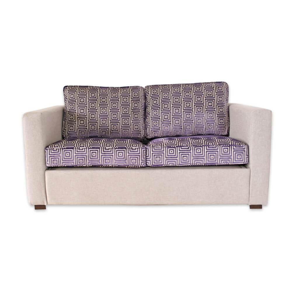 Trinity purple fabric hotel sofa bed with contrasting cushions and upholstered frame  - Designers Image