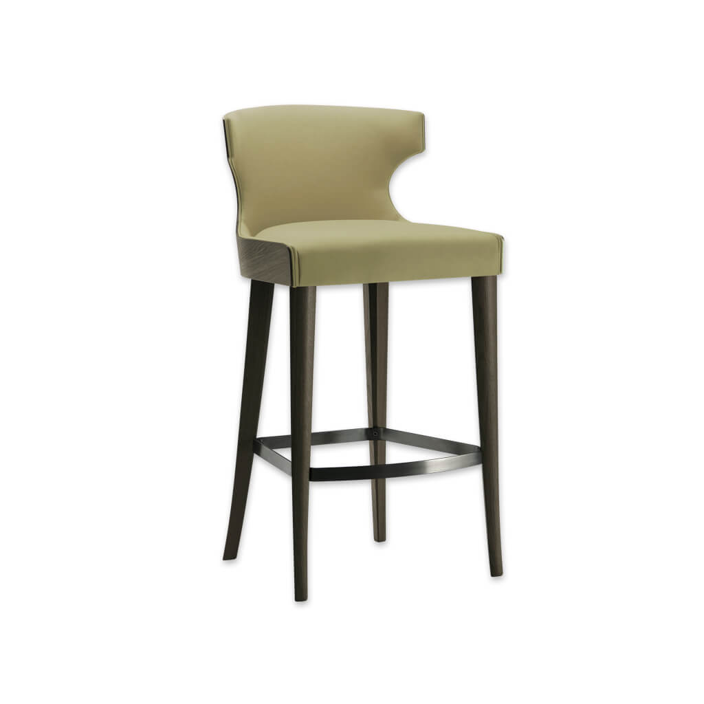 Una green bar stool with hammer head back rest and show wood rear. Featuring tapered legs and curved kick plate - Designers Image